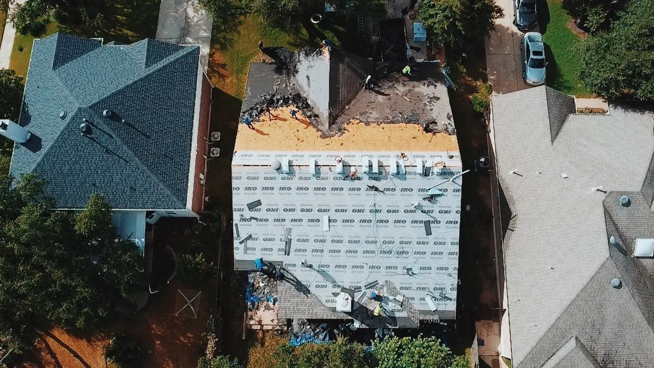 Aerial view of IKO underlayment installed across a roof deck